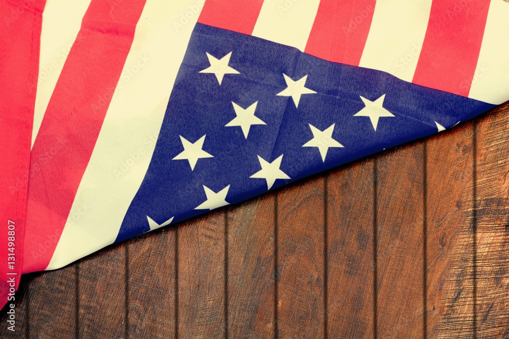 Fototapeta premium Vintage USA Flag on wood background