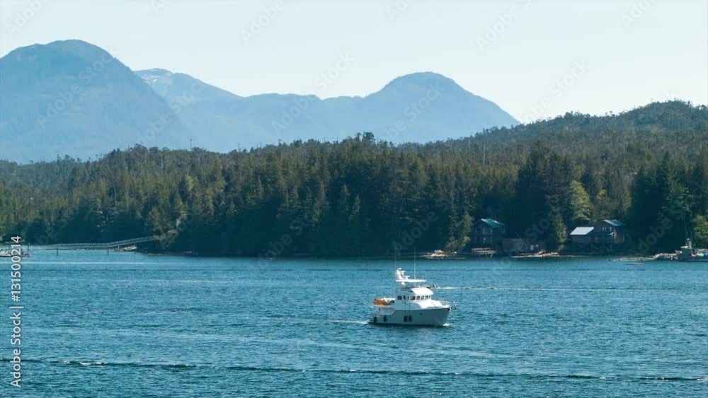 Private Boat in Ketchikan Alaska Sailing Through the Prestine Nature on a Hot and Sunny Summers Day Private Boat in Ketchikan Alaska Sailing Through the Prestine Nature on a Hot and Sunny Summers Day