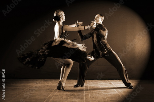 Fototapeta Naklejka Na Ścianę i Meble -  dancers in ballroom isolated on black background