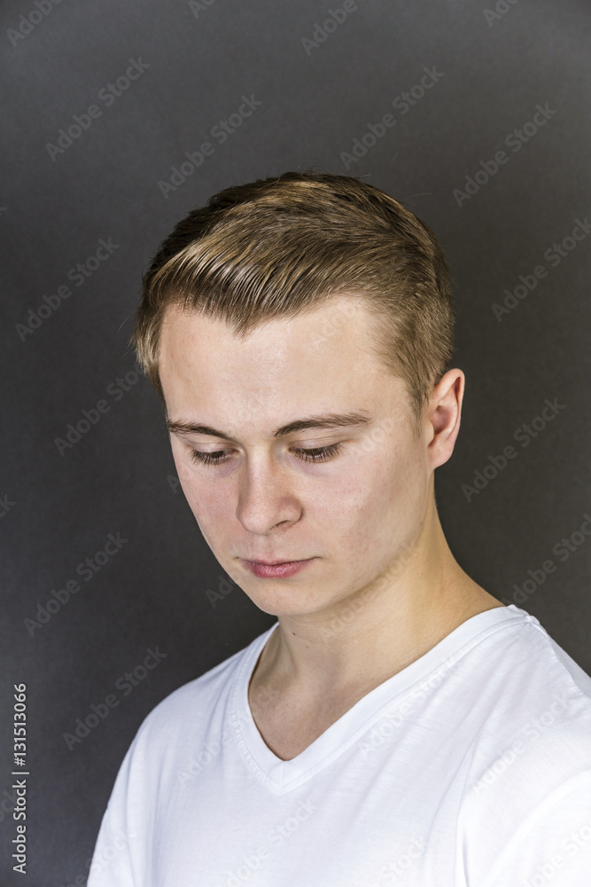 Fototapeta premium portrait of sad looking teenage boy