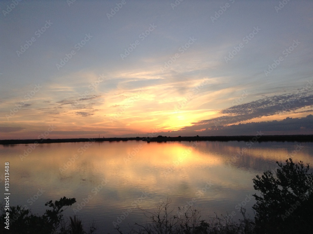 Fototapeta premium Sunset over salt marsh Cape Canaveral, FL