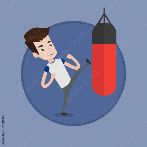 Man exercising with punching bag.