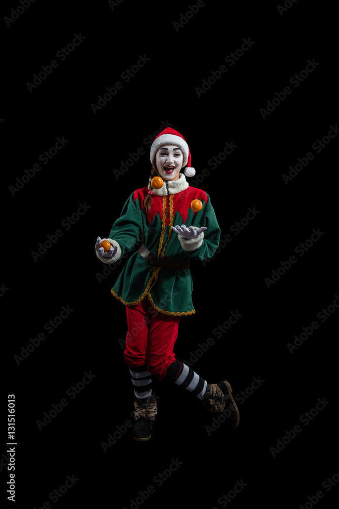 Female mime in New Year costume isolated