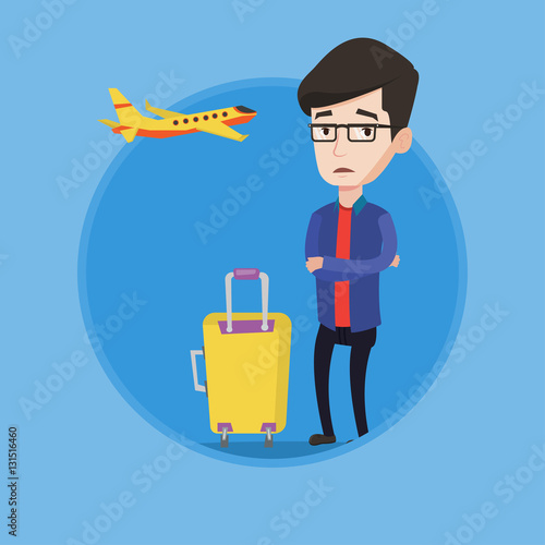Young man suffering from fear of flying.