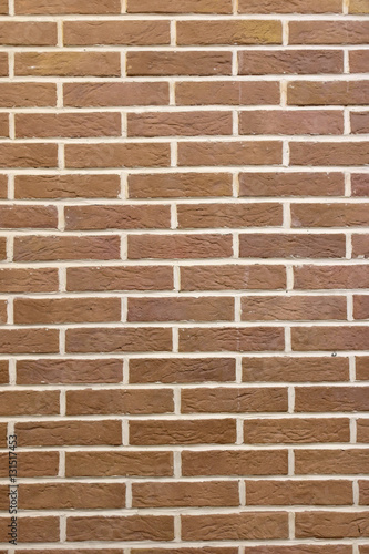 High resolution texture of a red brick wall. Laying horizontal t