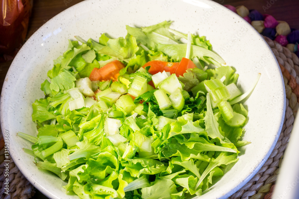 plate of mixed salad, with tomatoes