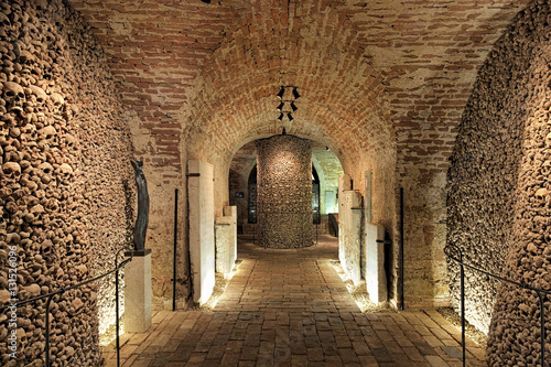Interior of the underground ossuary under the Church of St. James in Brno, Czech Republic. The ossuary holds the remains of over 50 thousand people which makes it the second-largest ossuary in Europe.