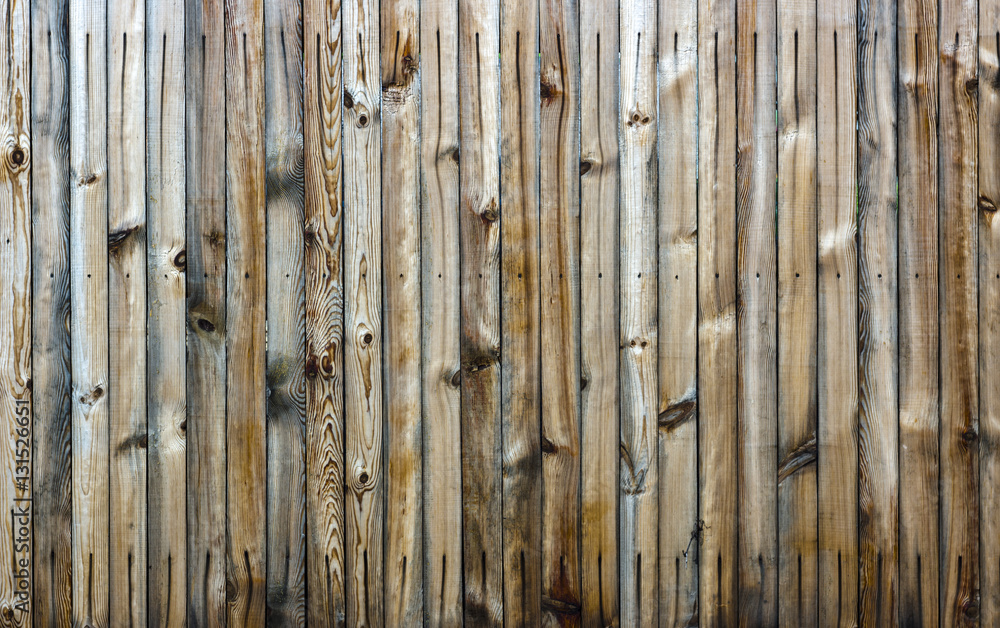 Natural knotted gray weathered wood plank texture background. Natural knotted gray weathered wood plank texture background.