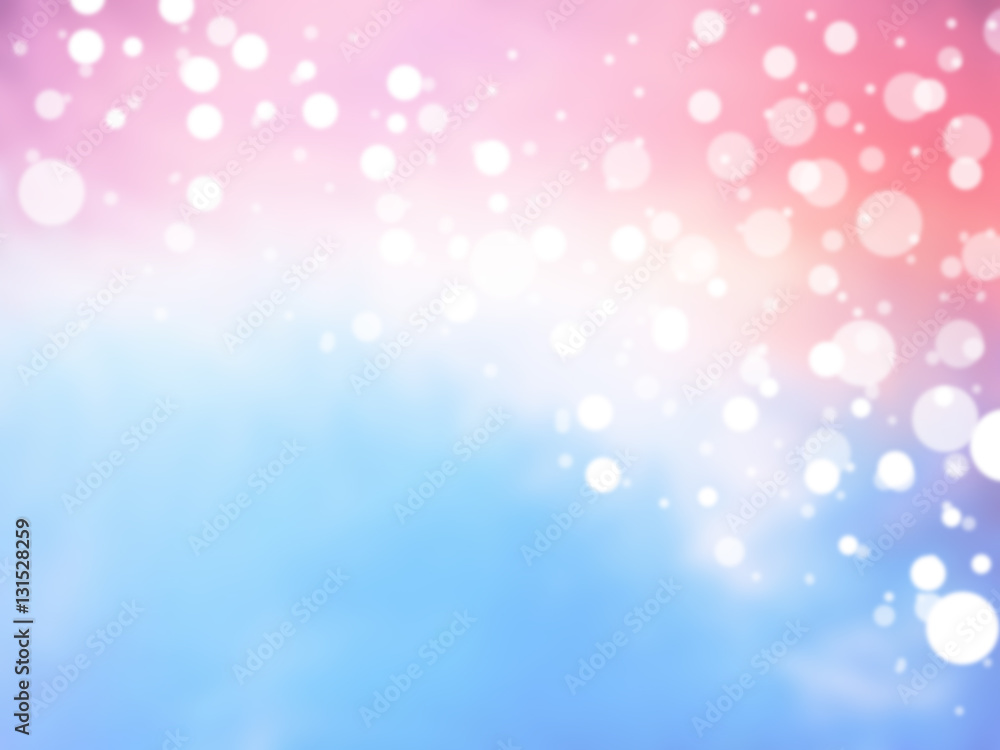 White bokeh on pastel gradient pink and blue background