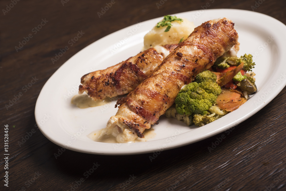 Punjena vesaljica - grilled pork tenderloin wrapped around bacon filled with mozzarella cheese Punjena vesaljica - grilled pork tenderloin wrapped around bacon filled with mozzarella cheese
