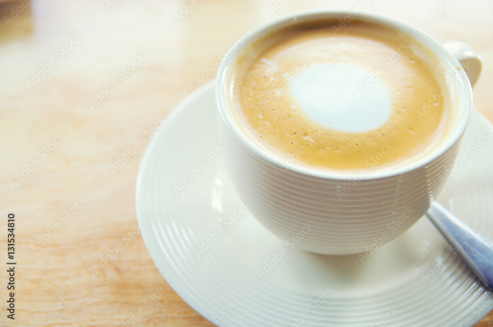 cup of coffee on table in cafe