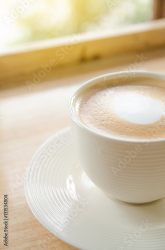 cup of coffee on table in cafe