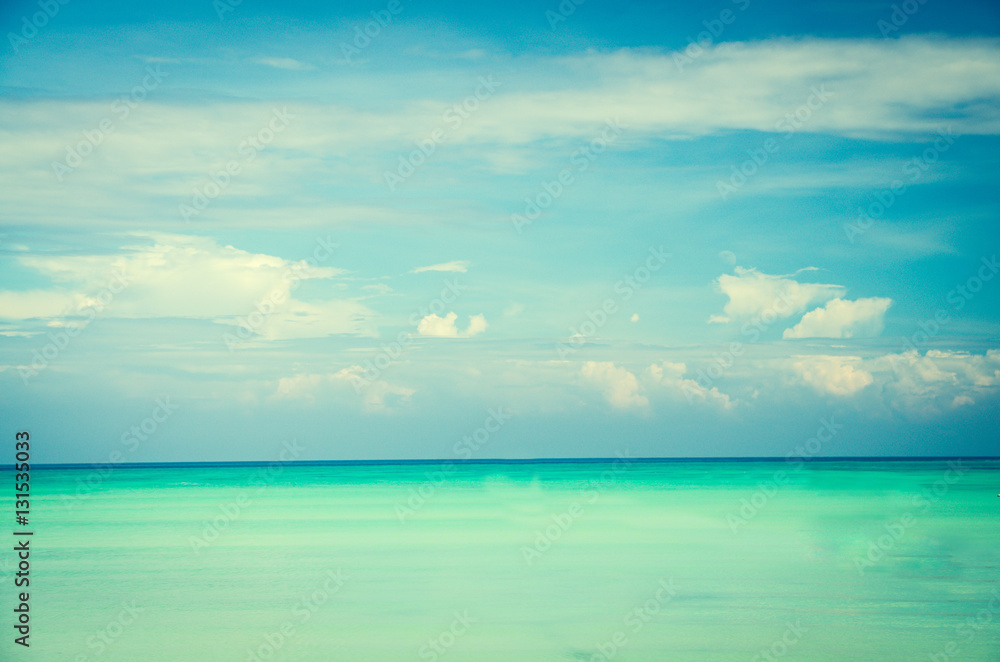 blue sea and clouds on sky