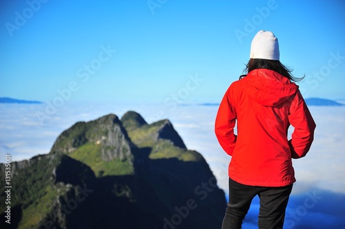 Young Woman on Mountain Peak