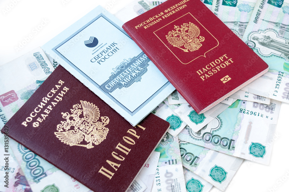 Savings book and a passport in the Russian money Savings book and a passport in the Russian money