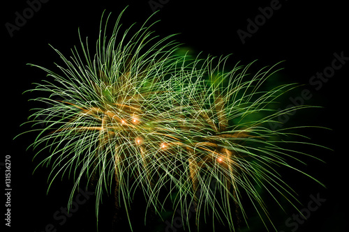 Green fireworks on black background at international competition in Montreal
