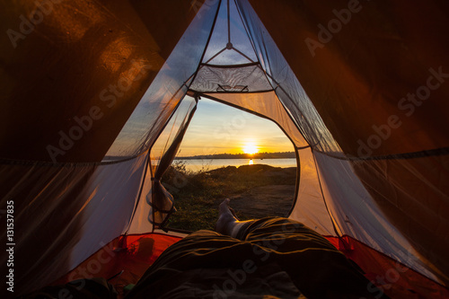 camping tent glow up with sunrise in morning