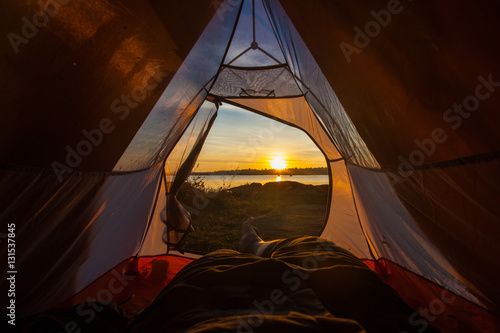 camping tent glow up with sunrise in morning