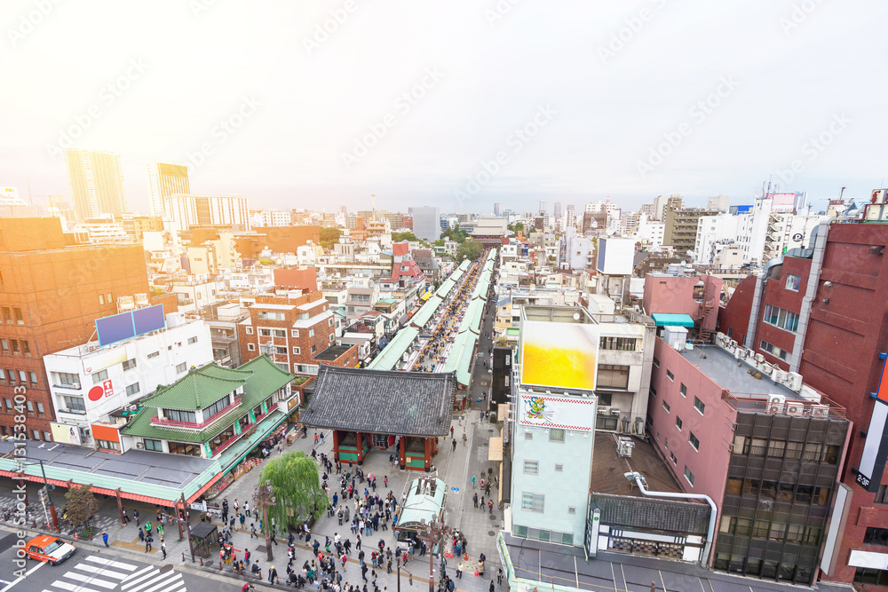 Business and culture concept - panoramic modern city skyline bird eye aerial view with Sensoji-ji Temple shrine - Asakusa district under dramatic sunrise and morning blue sky in Tokyo, Japan