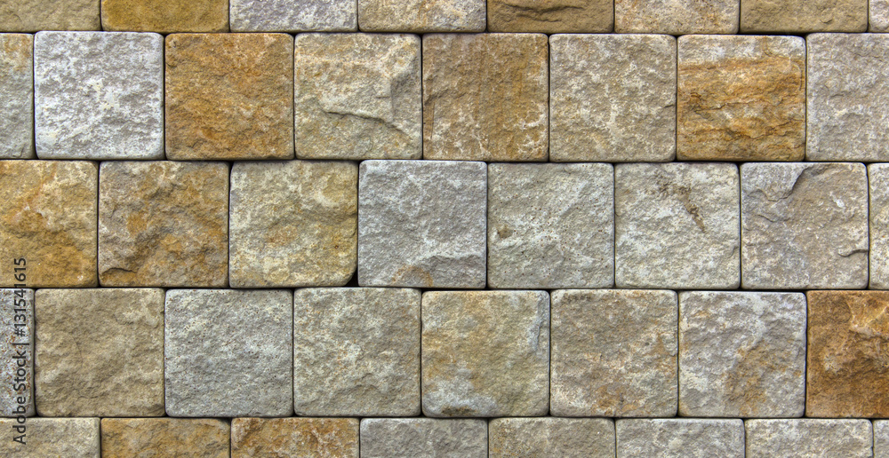 Naklejka premium yellow natural stone facade, wall tiles