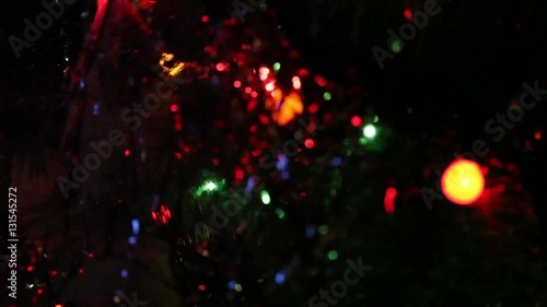 Flickering garlands on a holiday christmas fur-tree
