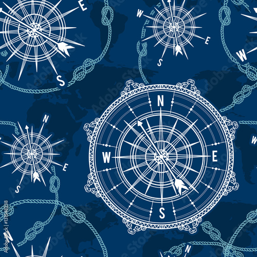 Seamless pattern with vintage compass, world map, wind rose and rope knot. Nautical background. Retro hand drawn vector illustration