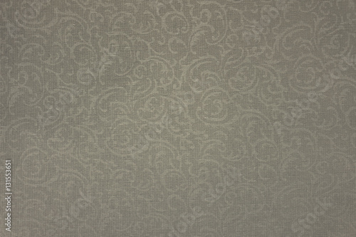 Floral patterns on the cloth against the old scheme.