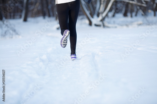 Young sportswoman engaged in running