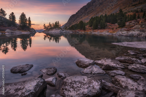 Mirror Lake Surface Reflecting Sunset Light And Pine Trees, Altai Mountains Highland Nature Autumn Landscape Photo