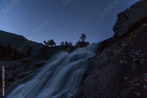 Misty Waterfall Long Exposure Early Night View With Stars On Clear Sky, Altai Mountains Highland Nature Autumn Landscape Photo