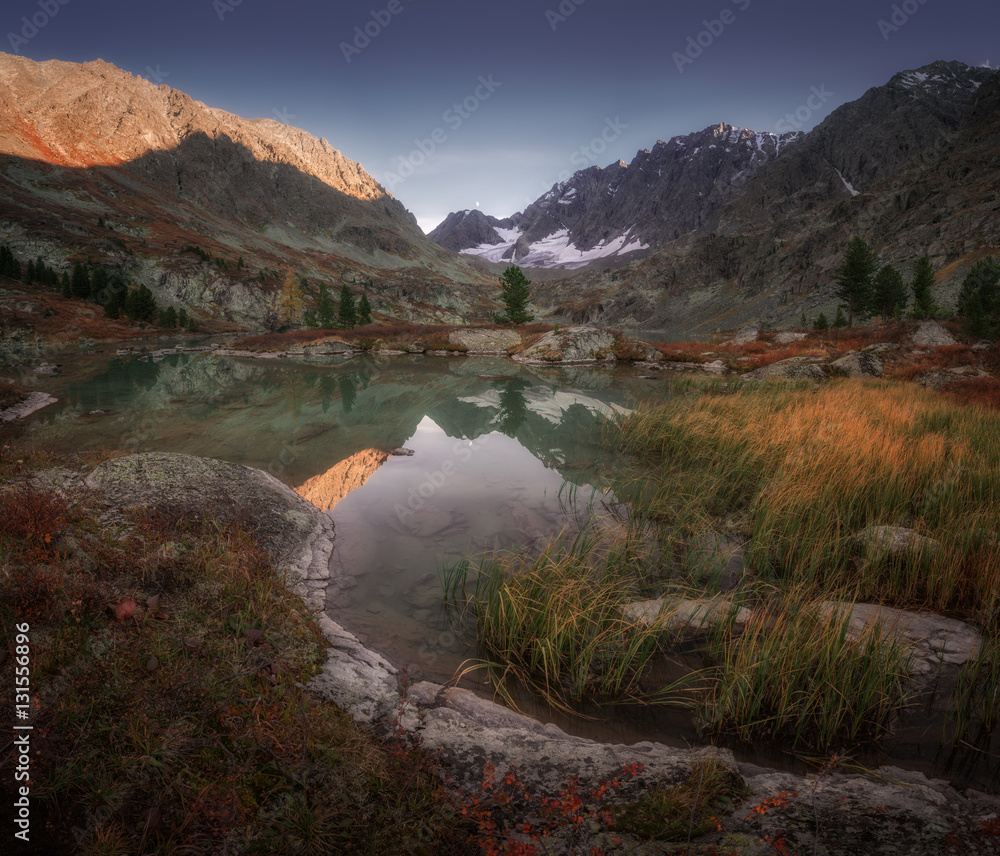 Small Mountain Lake View WIth Grassy Coast And Snowy Peaks, Altai Mountains Highland Nature Autumn Landscape Photo