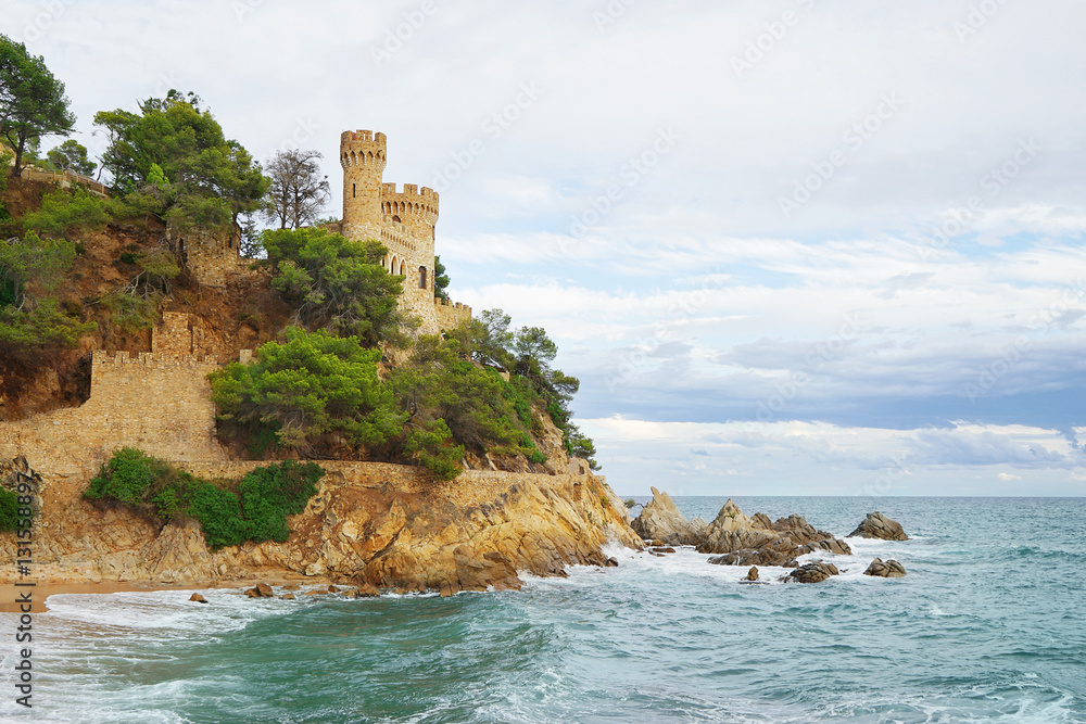 Ancient fortress on cliff near sea