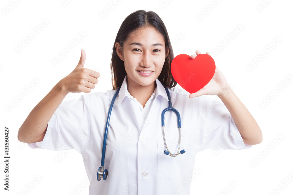 Young Asian female doctor show thumbs up with red heart. Young Asian female doctor show thumbs up with red heart.
