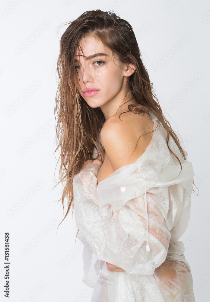 pretty wet girl in sexy raincoat