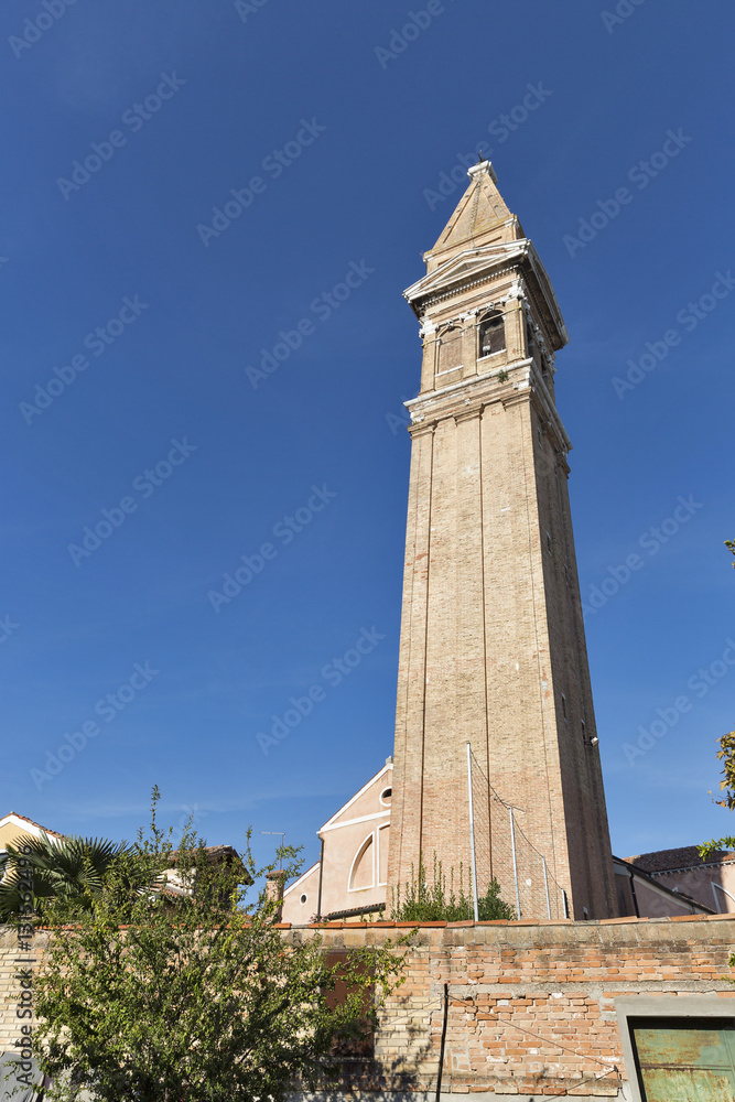 Leaning tower of San Martino church on Burano island, Italy.