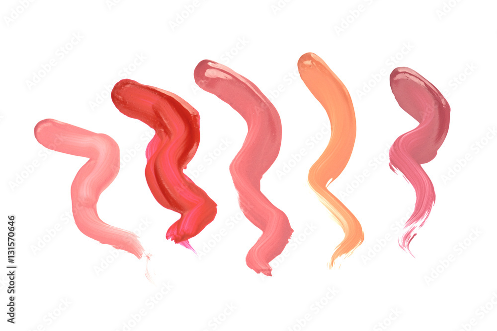 Several liquid lipstick different color strokes samples, isolated on white background Several liquid lipstick different color strokes samples, isolated on white background
