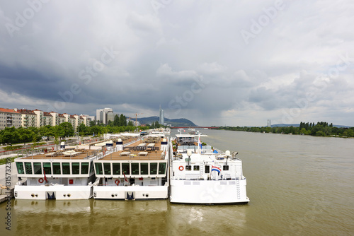 Photography Photo view on danube river with ferryboat, vienna, austria