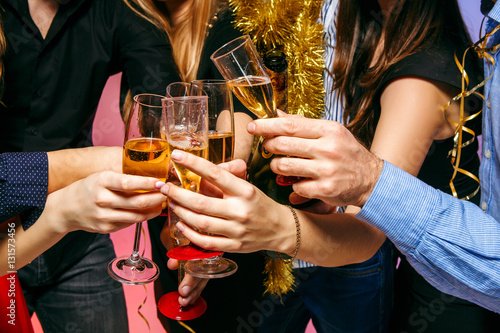 Photography Many young women and men drinking at christmas party