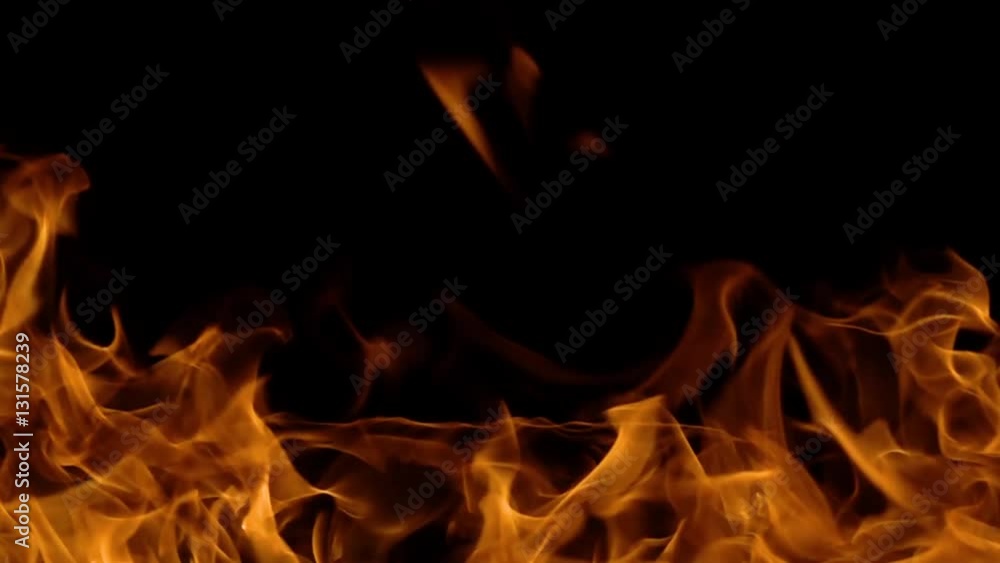 Flames of fire on black background in slow motion Flames of fire on black background in slow motion