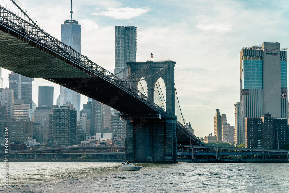 Brooklyn Bridge in New York City at sunset. Vivid splittoned image.  

