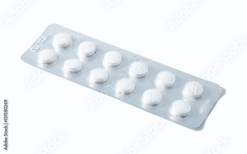 Aluminium blister pack of pills. The capsules are packaged in blisters, isolated on a white background. Disease. Flu. Medications.