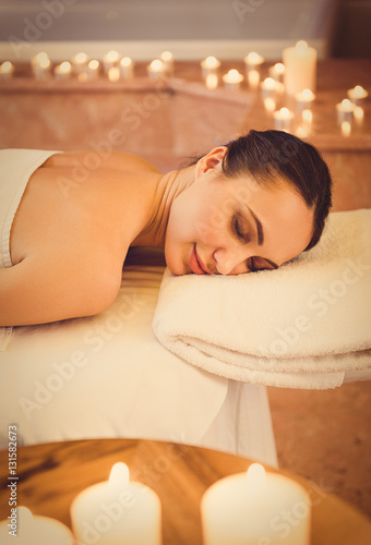 Voluptuous girl enjoying spa treatment