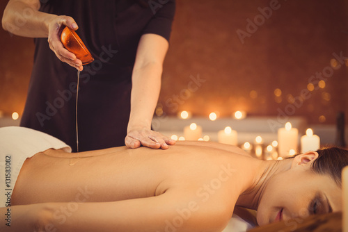 Fotografie Calm girl getting treatment at wellness center