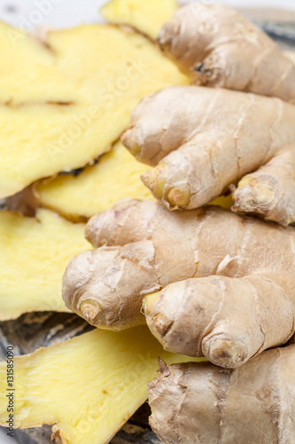 Fresh sliced ginger - ingredient for healthy food