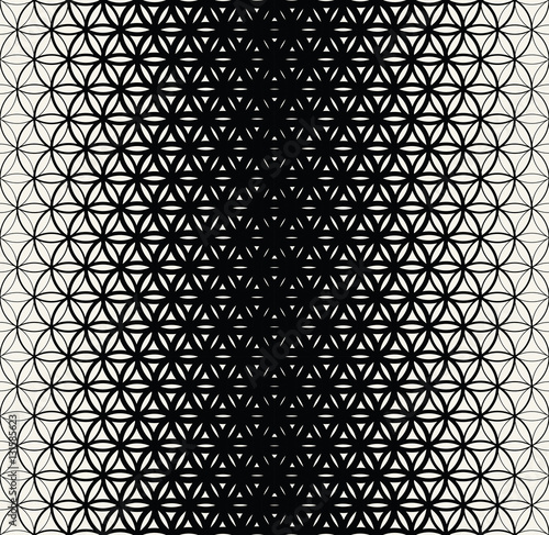 Abstract sacred geometry black and white gradient flower of life halftone  pattern