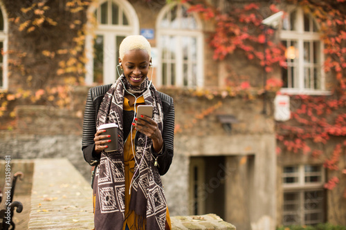 Pretty young black woman wi...