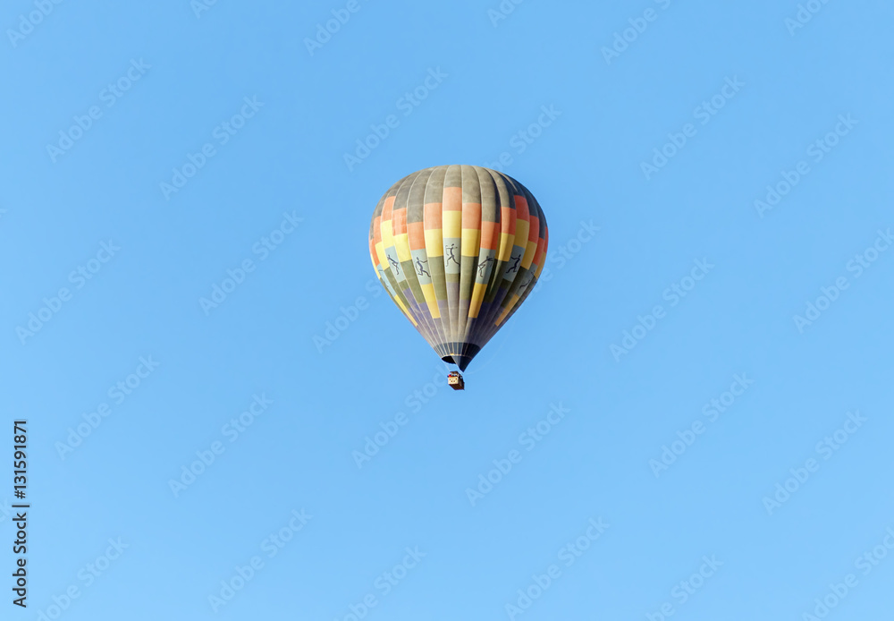 Hot air balloon flies over the Sossusvlei plato of Namib Naukluft National Park - Namibia, South Africa Hot air balloon flies over the Sossusvlei plato of Namib Naukluft National Park - Namibia, South Africa
