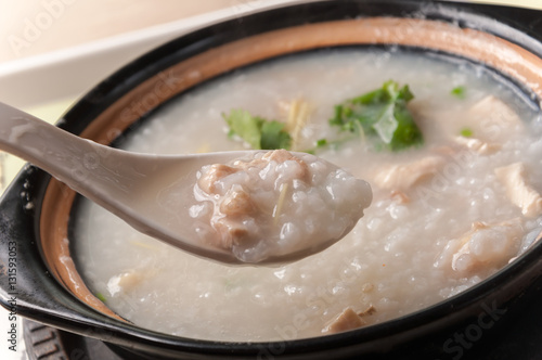 Porridge, abalone & chicken Porridge (congee) served in claypot