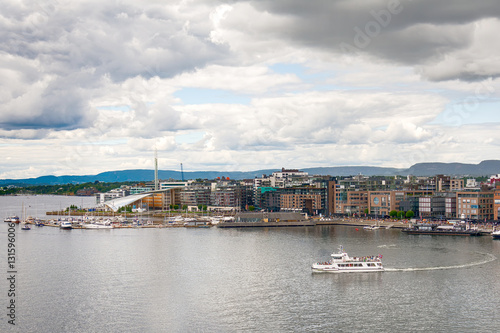 Boats in the canal, Aker Brygge district, in Oslo, Norway  © nedomacki