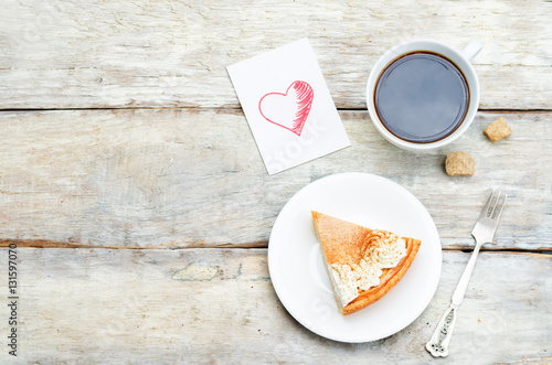 Plate with cake and cup of coffee